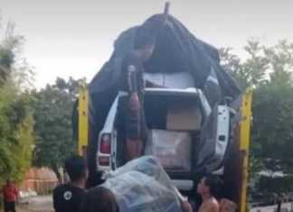 Akal-akalan Bisa Mudik, Mobil Dimasukkan Dalam Truk